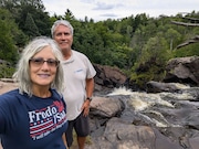 Jan and Marty Roberts pose at Gabbro Falls in the Upper Pensinsula, near Ironwood, on Monday, Aug. 5, 2024. Photo courtesy or Jan Roberts.