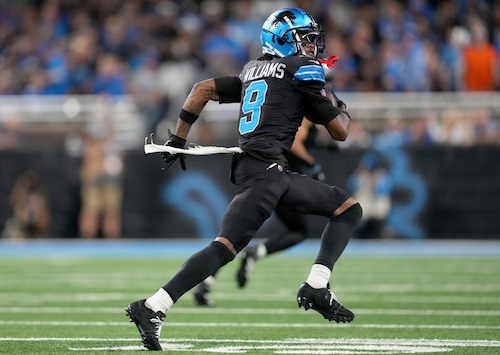 Detroit Lions wide receiver Jameson Williams sprints for the end zone after catching a pass during an NFL game against the Seattle Seahawks