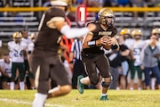 Bay City Western’s Nick Doran (3) runs the ball during a football game at Bay City Western High School on Friday, Sept. 20, 2024.