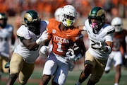 Texas wide receiver Johntay Cook II (1) runs up field against Colorado State after making a catch during the second half of an NCAA college football game in Austin, Texas, Saturday, Aug. 31, 2024. (AP Photo/Eric Gay)