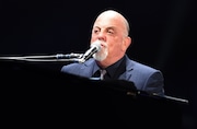 Billy Joel performs to a near sellout crowd at the Carrier Dome, Syracuse, N.Y., Friday March 20, 2015. Scott Schild | sschild@syracuse.com