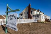 The exterior of Sleeping Bear Inn in Glen Haven, Mich. on Friday, Oct. 4, 2024.  The lodge in Sleeping Bear Dunes National Lakeshore recently reopened after it was shuttered in the 1970s. The getaway is the oldest inn in a national park, predating Old Faithful Inn in Yellowstone Park and was built sometime around 1866.