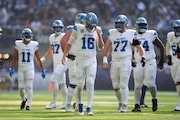 Detroit Lions quarterback Jared Goff (16) walks to huddle after a penalty during the first half of an NFL football game against the Minnesota Vikings Sunday, Oct. 20, 2024, in Minneapolis. (AP Photo/Abbie Parr)