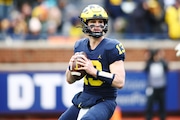Michigan quarterback Jack Tuttle looks to pass during the spring game at Michigan Stadium in Ann Arbor on Saturday, April 1, 2023.