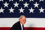 U.S. Sen. Carl Levin walks onto the stage with a smile during a Michigan Democratic Party rally on Wednesday, Oct. 22, 2014 at Riverfront Banquet Center in downtown Flint. Jake May | MLive.com Jake May | MLive.com