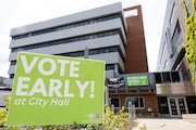 A sign alerts passerby to an early voting site inside Ann Arbor City Hall in Ann Arbor on Wednesday, July 31 2024.
