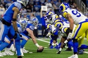 Detroit Lions center Frank Ragnow waits for the snap at the line of scrimmage during the NFL wild-card round playoff game on Sunday, Jan. 14, 2024 at Ford Field in Detroit.