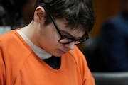 Ethan Crumbley sits in court listening to victim impact statements, Friday, Dec. 8, 2023, in Pontiac, Mich.  (AP Photo/Carlos Osorio, Pool)
