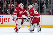 Detroit Red Wings goaltender Alex Lyon (34) replaces Cam Talbot (39) against the New York Rangers in the second period on Oct. 17, 2024. (AP Photo/Paul Sancya)