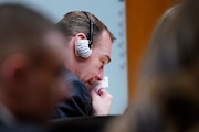 James Crumbley becomes emotional during the testimony of Oxford High School educator Molly Darnell as he sits with his attorney Mariell Lehman on Thursday, March. 7, 2024 in Pontiac, Mich.  James Crumbley, 47, is charged with four counts of involuntary manslaughter, one for each teenager killed by Ethan Crumbley at Oxford High School in 2021. (Mandi Wright/Detroit Free Press via AP, Pool)
