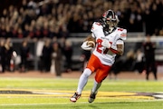 Grand Blanc sophomore running back Jeremiah Coleman finds some open room for a touchdown run during the first half on Friday, Oct. 18, 2024 at Cardinal Stadium. Grand Blanc defeated Davison 55-49.