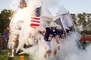 The Caledonia Fighting Scots take the field against the Hudsonville Eagles in a high school football game at Ralph E. Meyers Memorialn Stadium in Caledonia on Friday, October 18, 2024. 
