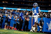 Detroit wide receiver Jameson Williams (9) runs onto the field during an NFL football game at Ford Field on Sunday, Sept. 15, 2024, in Detroit, Michigan. The Detroit Lions lost to the Tampa Bay Buccaneers 20-16.