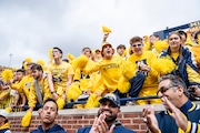 Michigan fans celebrate during Michigan vs Texas at Michigan Stadium in Ann Arbor on Saturday, Sept. 7, 2024. Texas defeated Michigan 31-12.