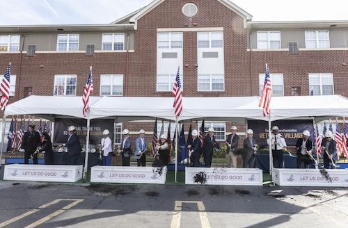 groundbreaking outside of a former hotel
