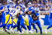 Detroit Lions running back David Montgomery (5) runs the ball during the NFL season opener at Ford Field in Detroit on Sunday, Sept. 8, 2024.
