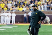 Michigan Wolverines head coach Sherrone Moore watches as Michigan hosts Fresno State at Michigan Stadium in Ann Arbor on Friday, Jan. 5, 2024.