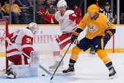 Detroit Red Wings goaltender Alex Lyon blocks a shot by Nashville Predators forward Gustav Nyquist during the second period Saturday. (AP Photo/George Walker IV)