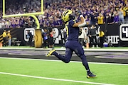 Michigan running back Donovan Edwards (7) runs into the end zone during the national championship against Washington at NRG Stadium in Houston on Monday, Jan. 8, 2024.