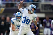 Detroit Lions place-kicker Jake Bates (39) celebrates his 44-yard field goal against the Minnesota Vikings during the second half of an NFL football game Sunday, Oct. 20, 2024, in Minneapolis. (AP Photo/Abbie Parr)